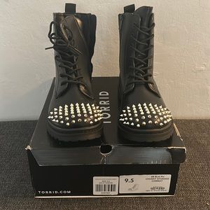 Brand New Black studded boots by Torrid. Size 9.5 brand never worn.